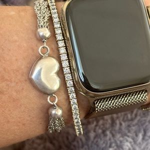 Silver heart bracelet.